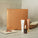 The Healthy Glow Ritual - natural bronzing trio by Tropic. A bronze-toned gift set box with three skincare products displayed in front: Skin Feast nourishing moisturiser, Sun Drops gradual tanning serum, and Sun Glaze illuminating bronzing drops.